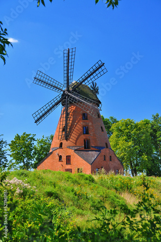 A brick Dutch windmill from the 19th century in Stara Różanka, Warmian-Masurian Voivodeship, Poland