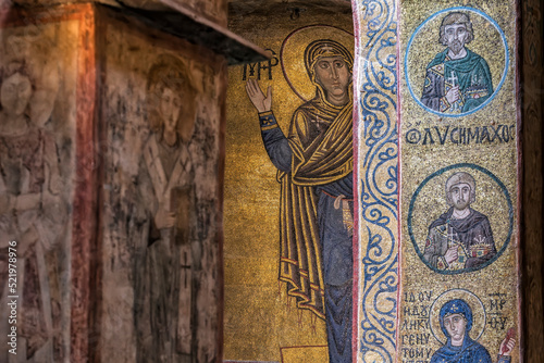 Interior of the St. Sophia Cathedral with mosaic Orans of Kyiv, frescoes on the wall and the golden altar. Kyiv, Ukraine