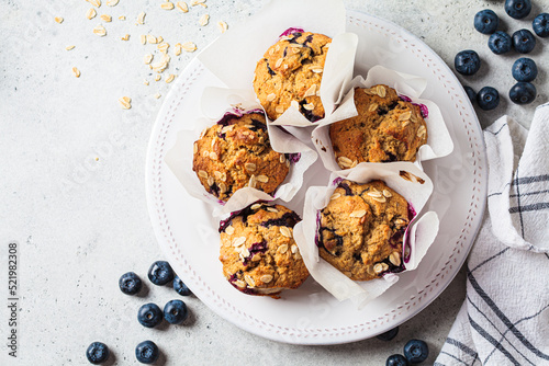 Photography Vegan oatmeal, banana, blueberry muffins on gray background