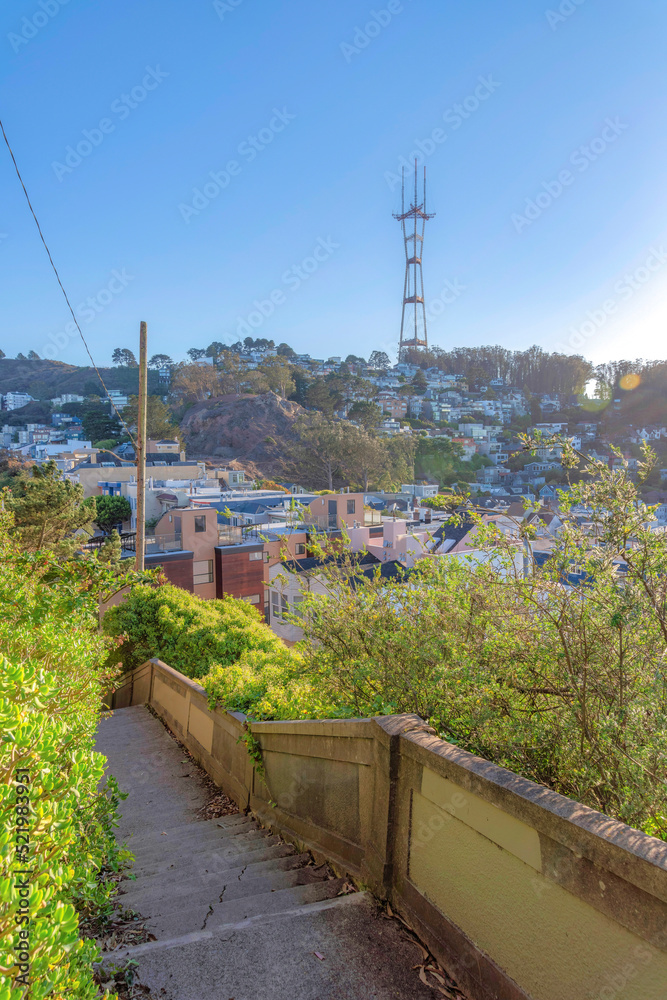 Concrete outdoor staircase with a view of the Sutro Tower in San Francisco, California
