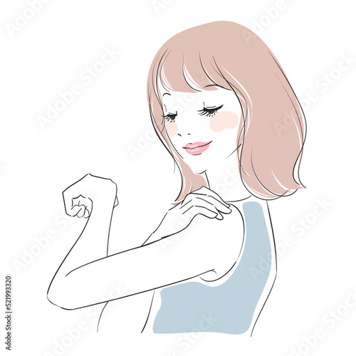 腕に日焼け止めを塗る美しい女性　