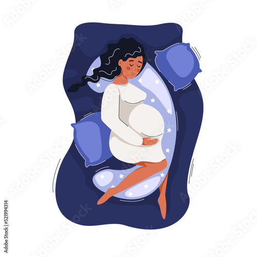 Young pregnant woman lying sleeping with pillows on bed. Concept pregnancy and childbirth, motherhood, health and care, relaxation.