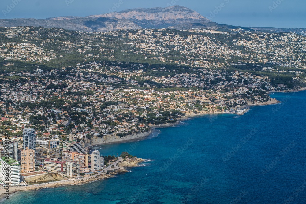 view of the coast, beaches and sea of ​​the city of Calpe with its apartment buildings and hotels