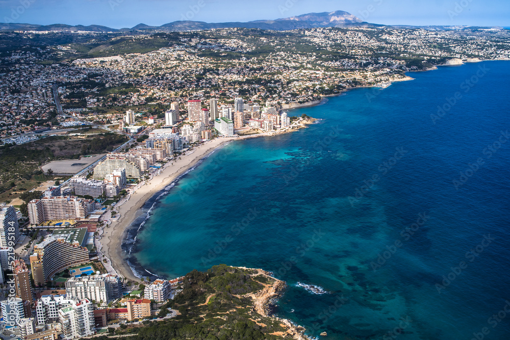 view of the coast, beaches and sea of ​​the city of Calpe with its apartment buildings and hotels