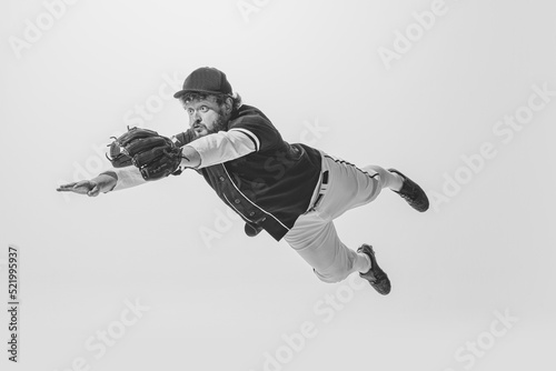 Photography Monochrome portrait of male baseball player wearing retro sports uniform and holding bat isolated on white background
