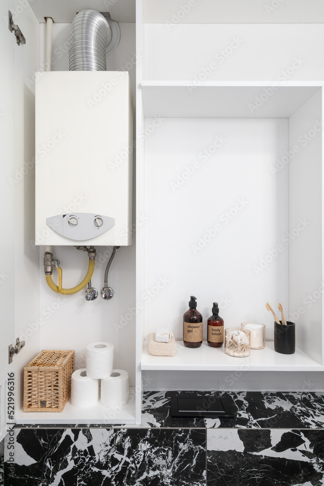 boiler, cosmetics and hygiene products for personal care in cabinet Stock  Photo | Adobe Stock