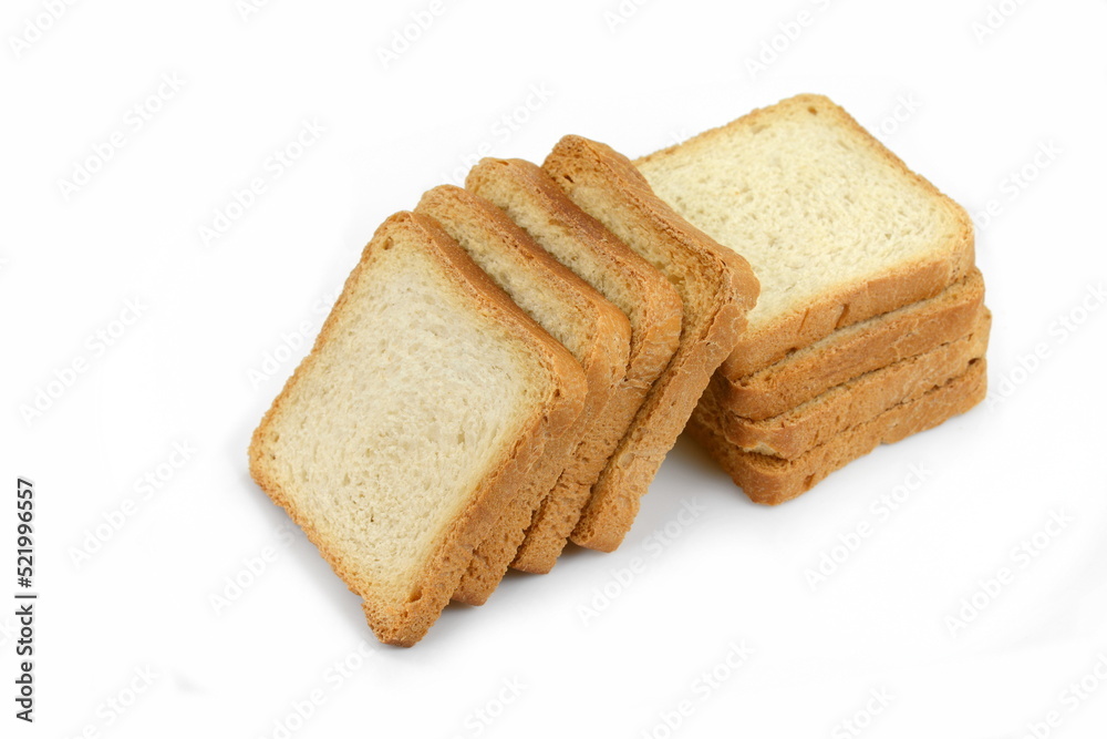 Integral whole wheat toast bread slices isolated on white background. Pieces of toast bread isolated on white. Close-up