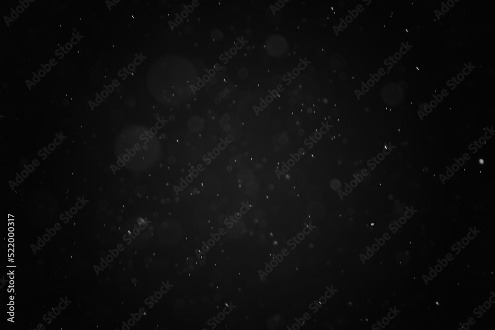 black bokeh background with dots light pattern. black bokeh background with dots light pattern.