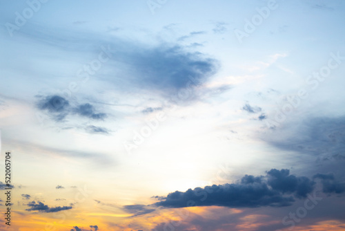 Blurred background. Blue sky and white fluffy clouds.