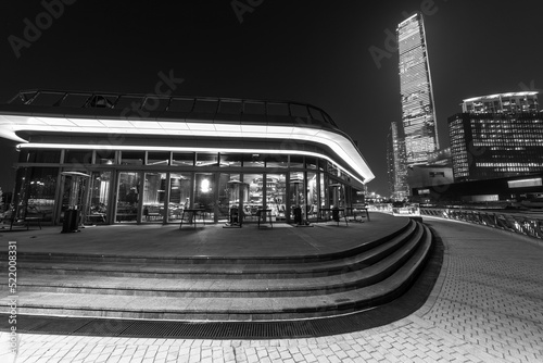 Skyscraper and restaurant in West Kowloon Cultural District in Hong Kong city