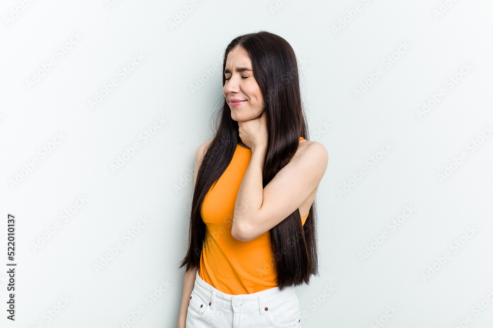 Young caucasian woman isolated on white background suffers pain in throat due a virus or infection. Young caucasian woman isolated on white background suffers pain in throat due a virus or infection.