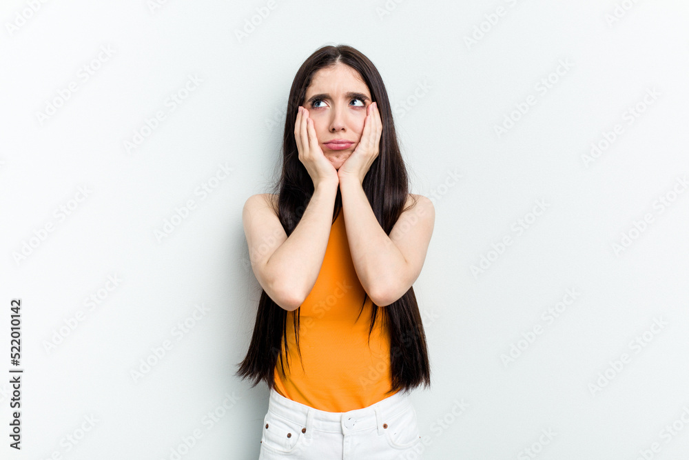 Young caucasian woman isolated on white background whining and crying disconsolately. Young caucasian woman isolated on white background whining and crying disconsolately.