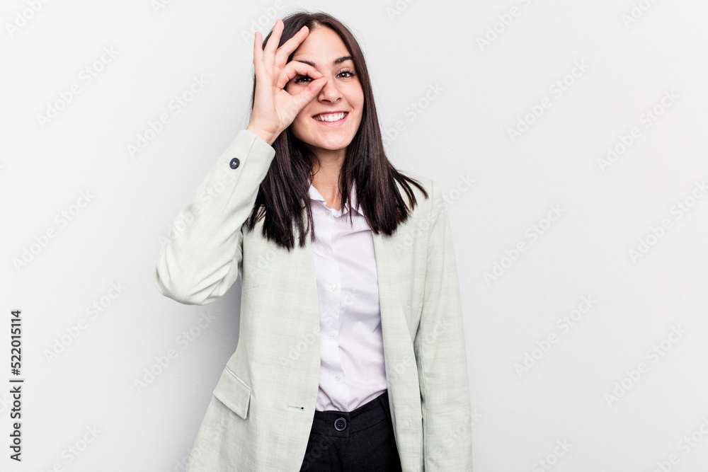 Young business caucasian woman isolated on white background excited keeping ok gesture on eye. Young business caucasian woman isolated on white background excited keeping ok gesture on eye.