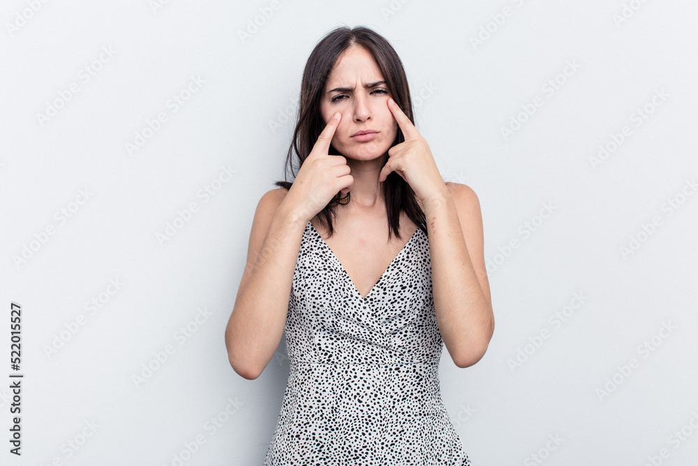 Young caucasian woman isolated on white background crying, unhappy with something, agony and confusion concept. Young caucasian woman isolated on white background crying, unhappy with something, agony and confusion concept.