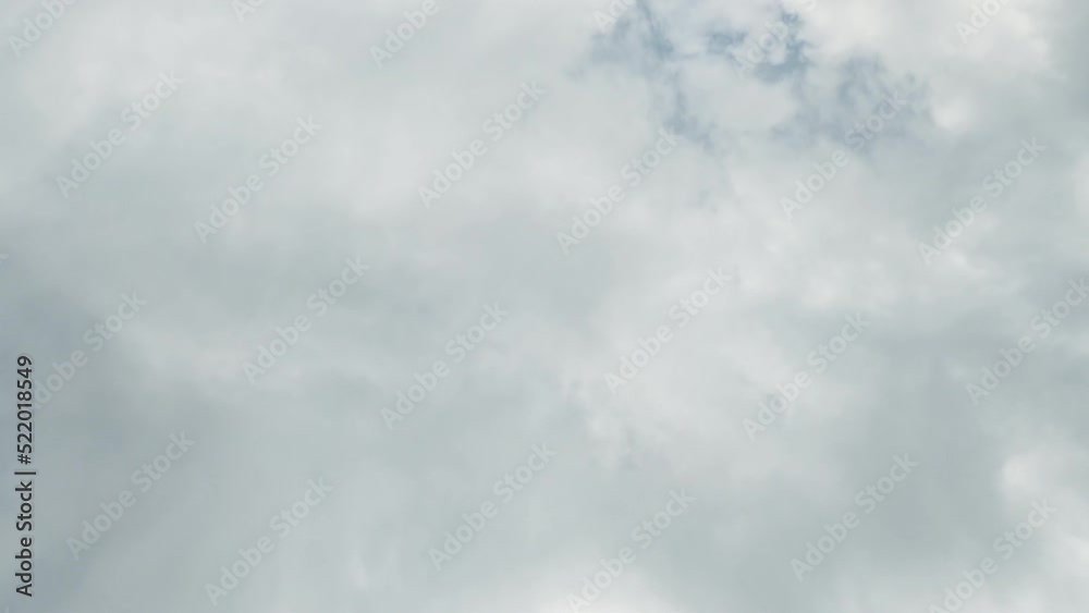 Sky paradise. Freedom inspiration. Aerial view. White fluffy clouds covering heaven flying away in motion.