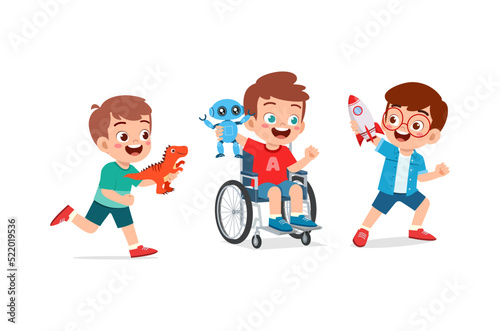 little kid on wheelchair play toy with friend