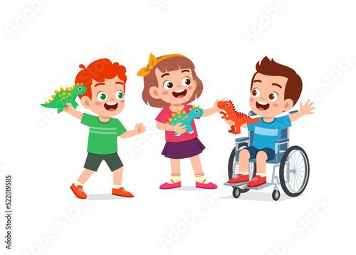 little kid on wheelchair play toy with friend