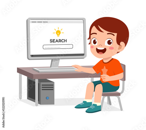 cute little kid use computer to study internet