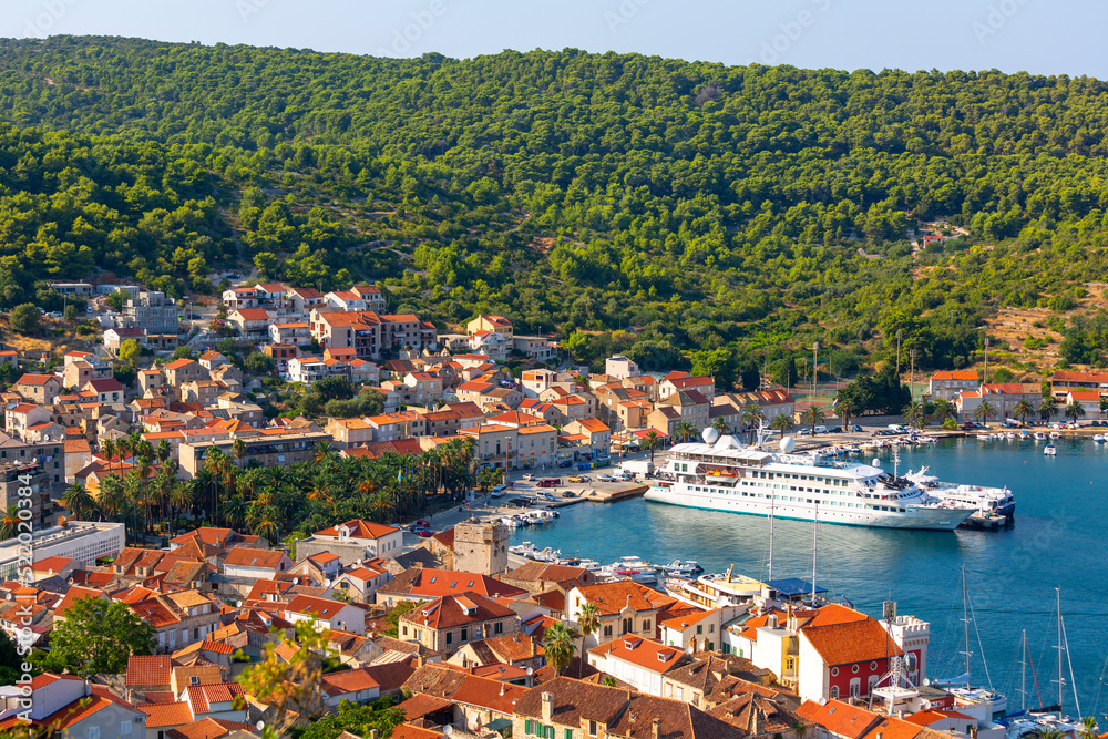 View of the city and port with passenger ferry which connects Split and Vis, Croatia