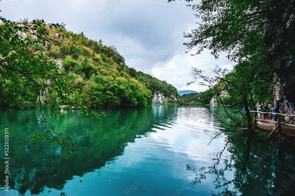 Obraz premium A stunning landscape of waterfalls, forests and lakes. Plitvice Lakes are the national pride of Croatia