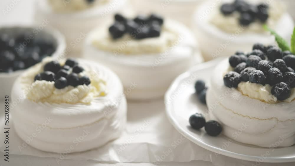 Homemade delicious mini Pavlova meringue made of fresh berries and mascarpone Homemade delicious mini Pavlova meringue made of fresh berries and mascarpone