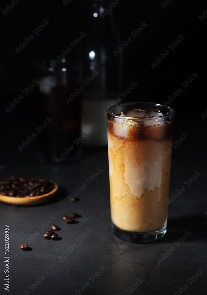 Cold coffee with ice in low key Cold coffee with ice in low key