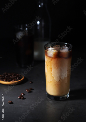 Cold coffee with ice in low key