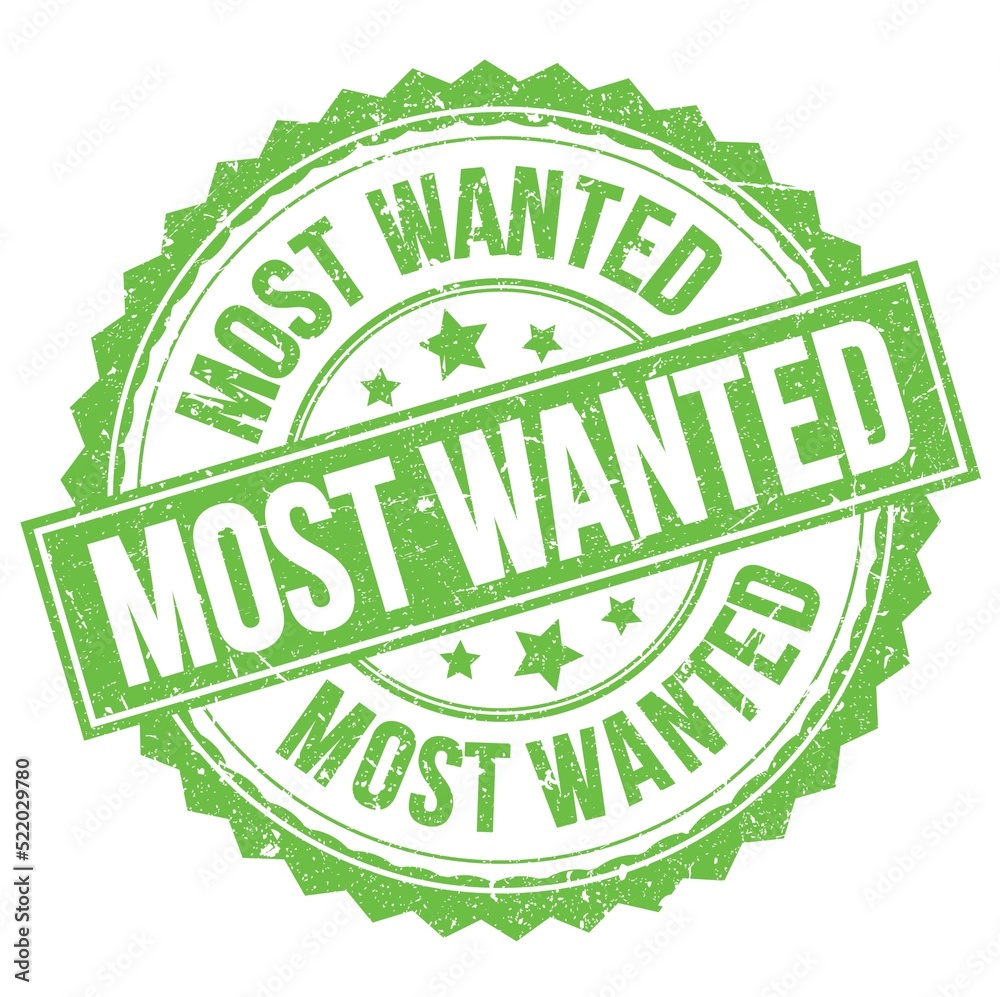 MOST WANTED text on green round stamp sign MOST WANTED text on green round stamp sign