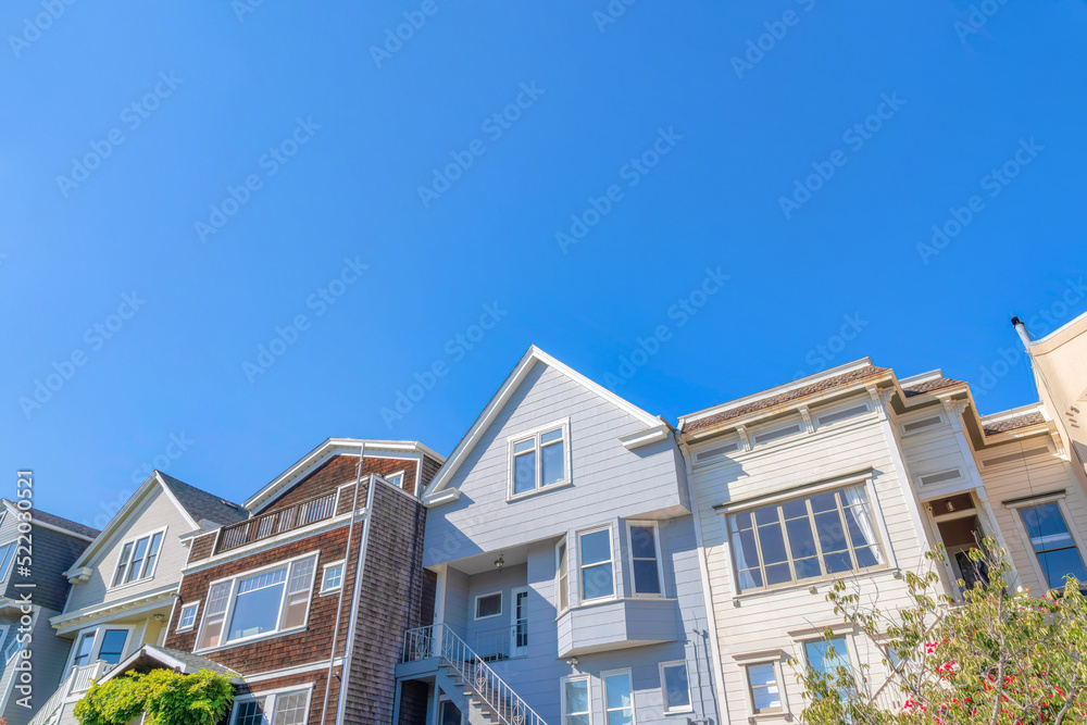 Facade of rowhouses in San Francisco, California against the sky Facade of rowhouses in San Francisco, California against the sky