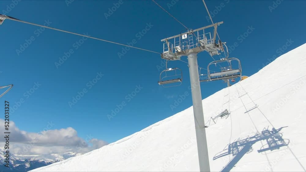 View with snowy mountains and blue sky at ski resort of Les 2 Alpes, France. View with snowy mountains and blue sky at ski resort of Les 2 Alpes, France.