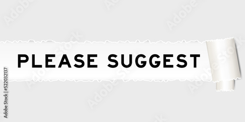 Ripped gray paper background that have word please suggest under torn part