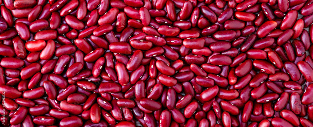 Red beans background. Red beans seeds. Adzuki bean background. Pile of red bean shot from above. Red beans background. Red beans seeds. Adzuki bean background. Pile of red bean shot from above.