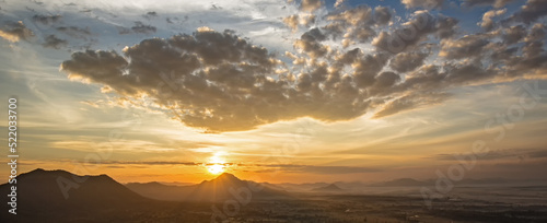 photo twilight sky background. Colorful Sunset sky and cloud. Vivid sky in twilight time background. Fiery orange sunset sky. Beautiful