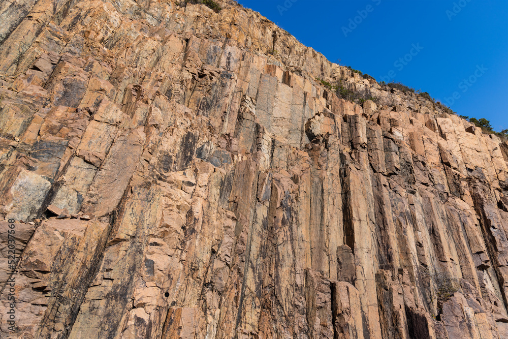 Fototapeta premium Hexagonal rock formation in geopark near east dam in sai kung of Hong Kong
