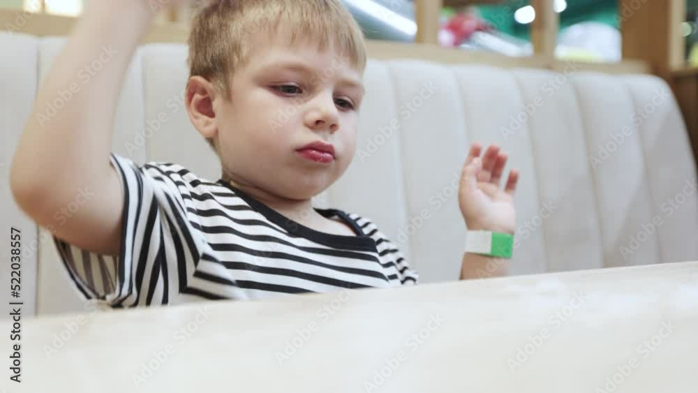 Boy coughing and waving his hands Boy coughing and waving his hands