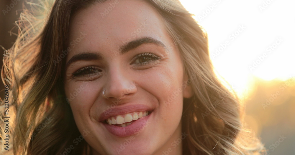 Hispanic latina girl smiling and laughing to camera. Portrait of young woman looking to directly to camera happy with authentic laugh Hispanic latina girl smiling and laughing to camera. Portrait of young woman looking to directly to camera happy with authentic laugh