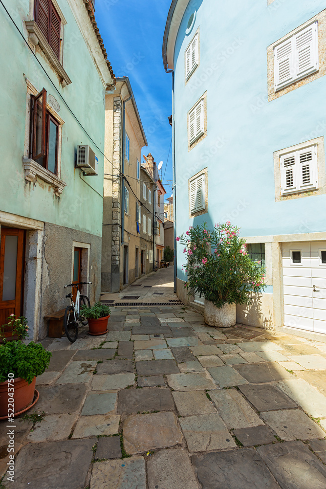 street scene with old houses in the town of Cres, Island of Cres, Kvarner, Croatia.