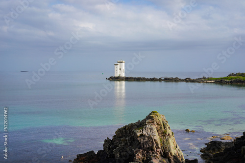 The Carraig Fhada lighthouse near Port Ellen on the isle of Islay photo
