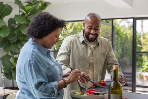 Mature black couple preparing a healthy meal