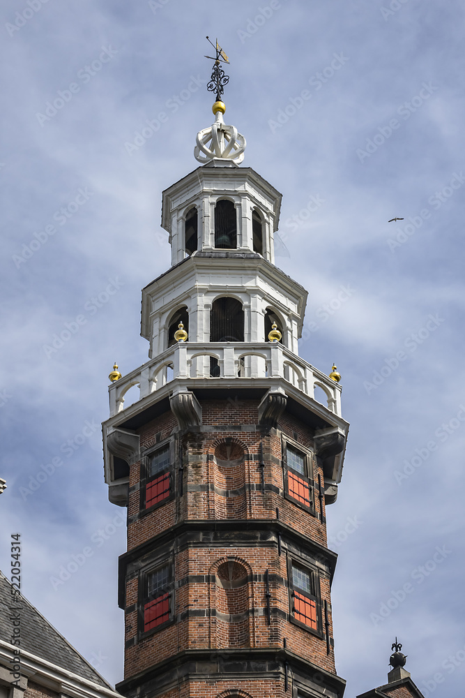 Renaissance-style Old Town Hall (Oude Stadhuis, built in 1565) with its carvings and turret. The Hague (Den Haag), The Netherlands. Renaissance-style Old Town Hall (Oude Stadhuis, built in 1565) with its carvings and turret. The Hague (Den Haag), The Netherlands.
