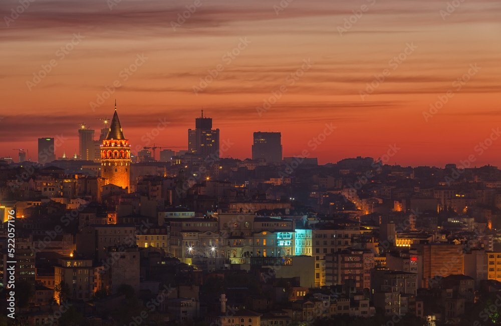 Beyoglu district historic architecture and Galata tower medieval landmark on sunrise in Istanbul, Turkey