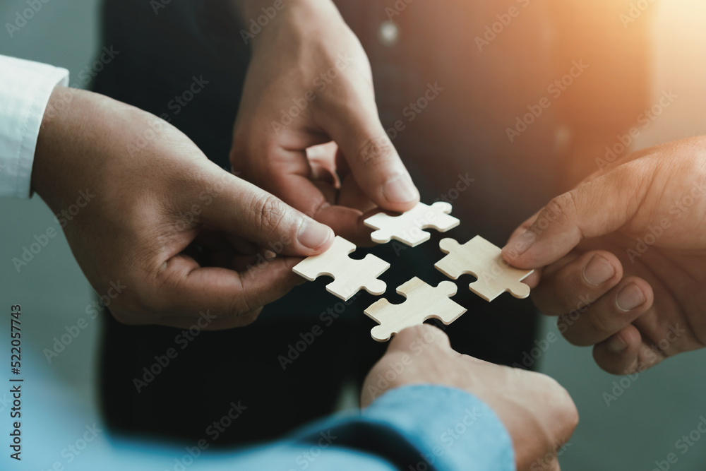mobile jigsaw puzzle pieces business cooperation concept teamwork and cooperation Businessmen join a jigsaw team, charity, volunteerism, unity, teamwork. mobile jigsaw puzzle pieces business cooperation concept teamwork and cooperation Businessmen join a jigsaw team, charity, volunteerism, unity, teamwork.