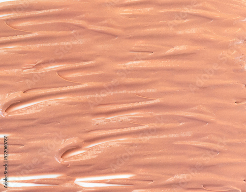 Swatch of foundation tone cream texture background