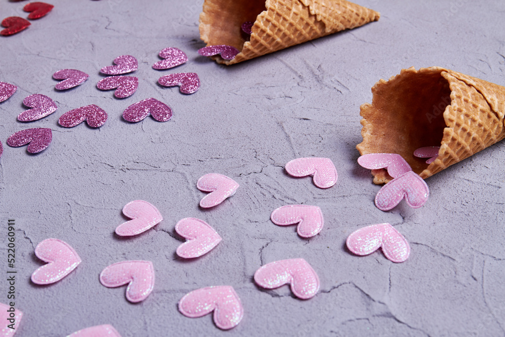 Close up pink and purple sequin hearts. Valentines day or creative concept. Close up pink and purple sequin hearts. Valentines day or creative concept.