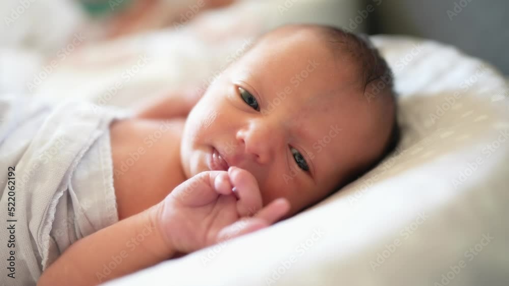 baby newborn. little baby a newborn 1 month of life lies in bed in the maternity hospital. happy family kid dream concept. close-up baby indoors. beautiful lifestyle cute girl lies at home baby newborn. little baby a newborn 1 month of life lies in bed in the maternity hospital. happy family kid dream concept. close-up baby indoors. beautiful lifestyle cute girl lies at home
