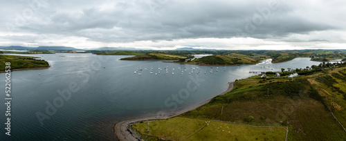 panorama landscape of Rosmoney Pier and marina and the drumlin islands of Clew Bay