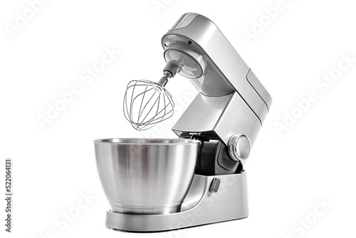 Silver food processor with whisk on white background isolated, kitchen electric mixer, Modern kitchen appliance for cooking photo