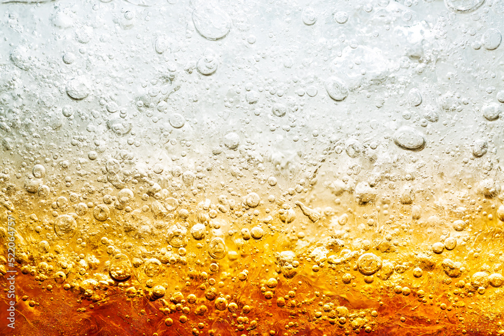 macro soft drink background,Close up view of the ice cubes in cola background macro soft drink background,Close up view of the ice cubes in cola background