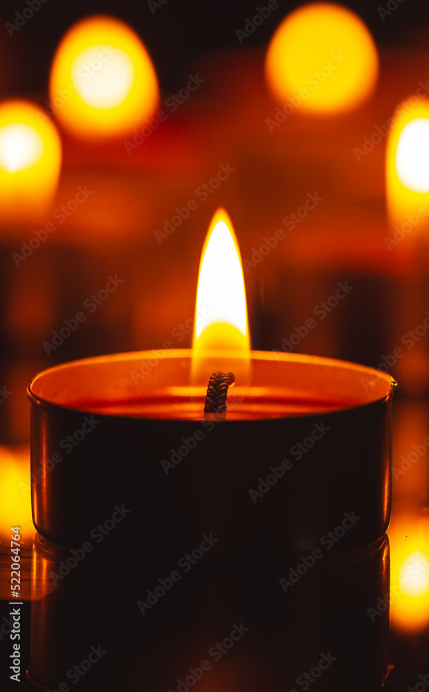 Scented candle,scented candles on old wooden background,Symbol of eternal memory, mourning, minutes of silence, memorial day. The concept of loss and to the memory 