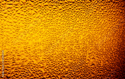 Macro beer bottle texture Water drops texture on the bottle of beer. Abstract background Water drops background